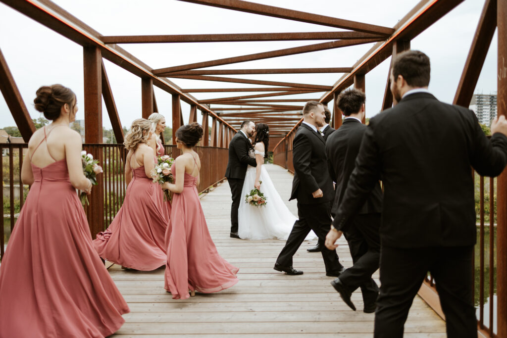 bridal party photos on the Downtown Cambridge bridge 
