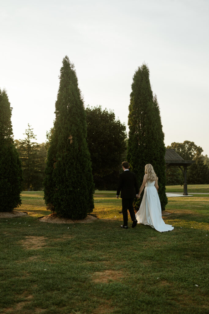 couples wedding photos st. mary's ON in front of european trees