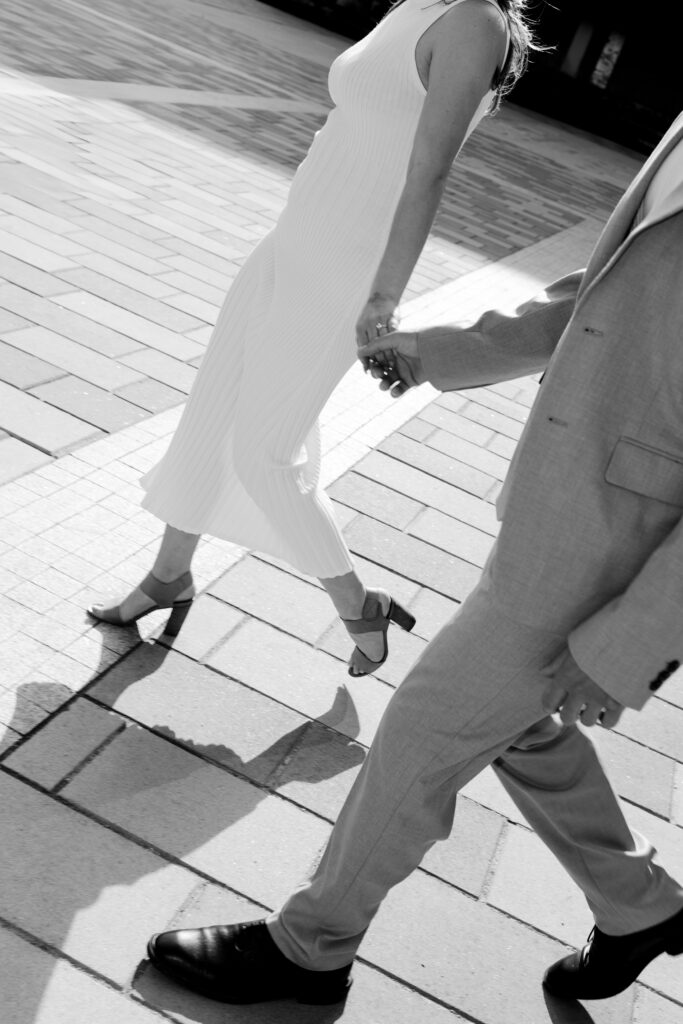 holding hands during engagement photos