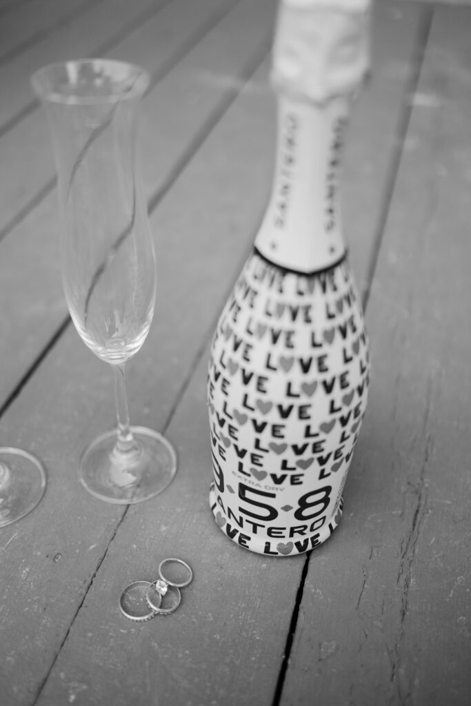 champagne pop for engagement photos 