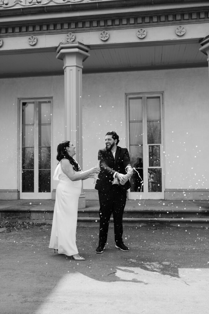 champagne pop for engagement photos at dundurn castle taken by hematite images 